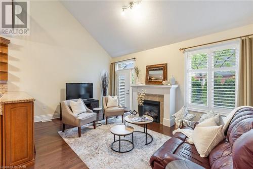 2120 Itabashi Way Unit# 217, Burlington, ON - Indoor Photo Showing Living Room With Fireplace