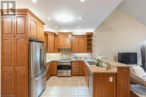 2120 Itabashi Way Unit# 217, Burlington, ON - Indoor Photo Showing Kitchen With Double Sink