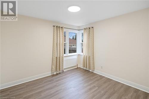 Main floor secondary bedroom - 19 Fawell Avenue, St. Catharines, ON - Indoor Photo Showing Other Room