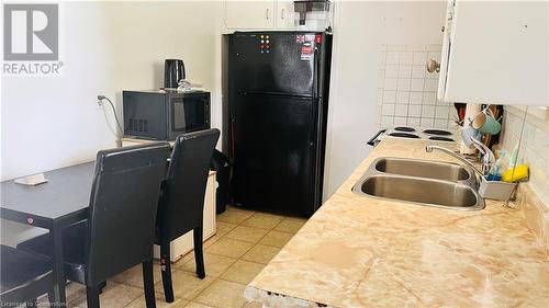 5108 Montrose Road Unit# Unit 1, Niagara Falls, ON - Indoor Photo Showing Kitchen With Double Sink