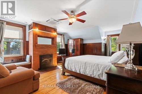 2 Johnson Street, Prince Edward County (Picton), ON - Indoor Photo Showing Bedroom With Fireplace