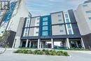 16 Concord Place Unit# 609, Grimsby, ON  - Outdoor With Facade 