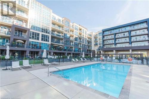 16 Concord Place Unit# 609, Grimsby, ON - Outdoor With In Ground Pool With Balcony