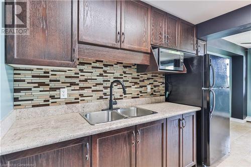 793 Colborne Street Unit# 403, Brantford, ON - Indoor Photo Showing Kitchen With Double Sink