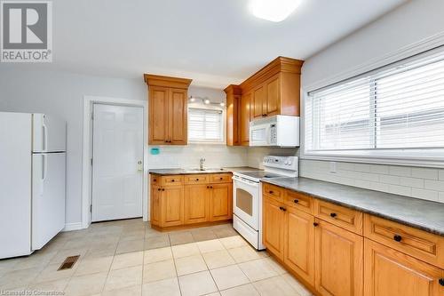 9 Atkinson Avenue Unit# Main, Toronto, ON - Indoor Photo Showing Kitchen With Double Sink