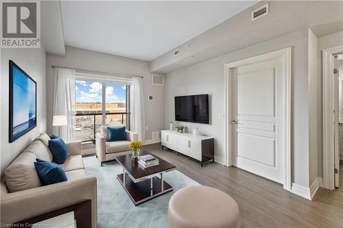 Virtually Staged - 212 Lakeport Road Unit# 312, St. Catharines, ON - Indoor Photo Showing Living Room