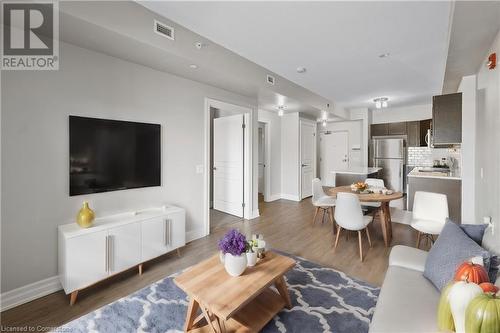 Virtually Staged - 212 Lakeport Road Unit# 312, St. Catharines, ON - Indoor Photo Showing Living Room