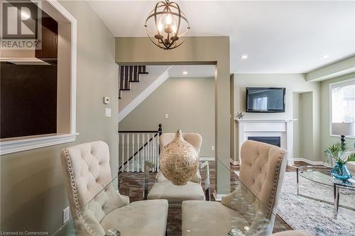 470 Beach Boulevard Unit# 67, Hamilton, ON - Indoor Photo Showing Dining Room With Fireplace