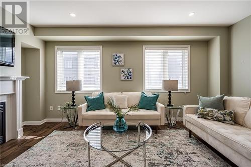 470 Beach Boulevard Unit# 67, Hamilton, ON - Indoor Photo Showing Living Room With Fireplace