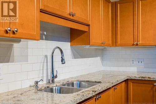 66 Bay Street S Unit# 613, Hamilton, ON - Indoor Photo Showing Kitchen With Double Sink