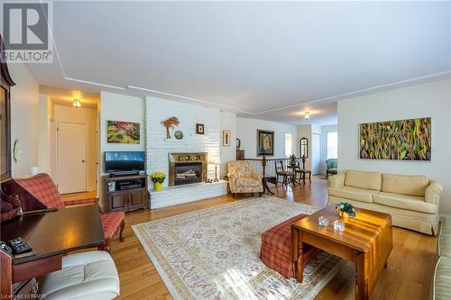 32 Gibson Drive, Simcoe, ON - Indoor Photo Showing Living Room With Fireplace