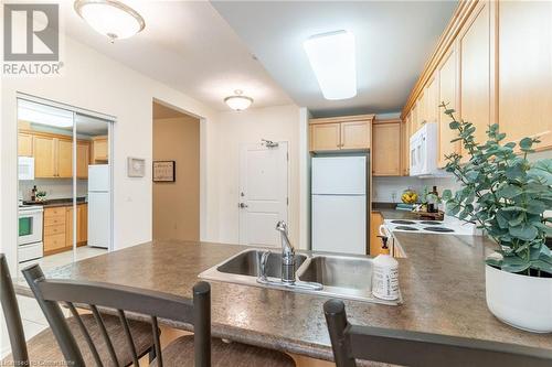 125 Wilson Street W Unit# 216, Ancaster, ON - Indoor Photo Showing Kitchen With Double Sink