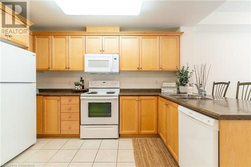 125 Wilson Street W Unit# 216, Ancaster, ON - Indoor Photo Showing Kitchen With Double Sink