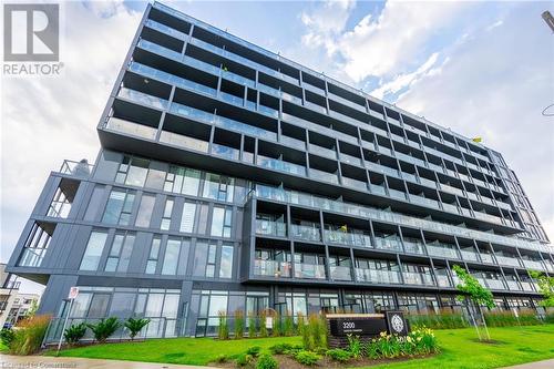 3200 Dakota Common Unit# B717, Burlington, ON - Outdoor With Balcony With Facade