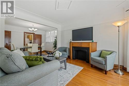 24 Thorndale Street N, Hamilton, ON - Indoor Photo Showing Living Room With Fireplace