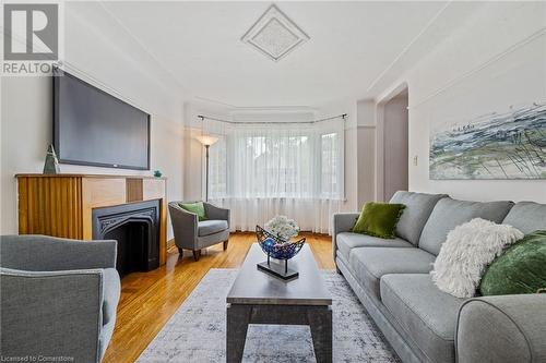 24 Thorndale Street N, Hamilton, ON - Indoor Photo Showing Living Room With Fireplace