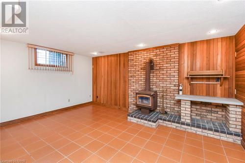 Virtually Staged - 22 Glen Park Court, Hamilton, ON - Indoor Photo Showing Other Room With Fireplace