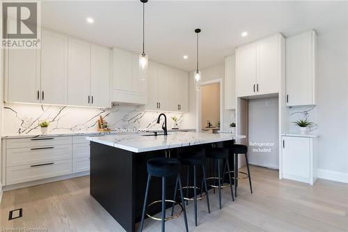 Modern kitchen with lots of cupboards - 1 West Avenue, Stoney Creek, ON - Indoor Photo Showing Kitchen With Upgraded Kitchen