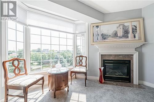 990 Golf Links Road Unit# 308, Hamilton, ON - Indoor Photo Showing Living Room With Fireplace