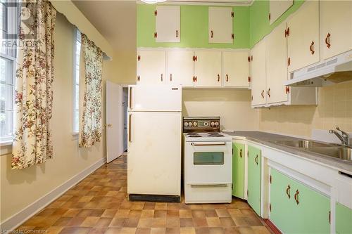 321 Main Street W, Hamilton, ON - Indoor Photo Showing Kitchen With Double Sink