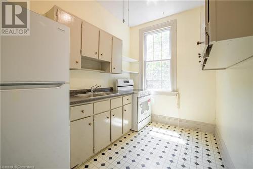 321 Main Street W, Hamilton, ON - Indoor Photo Showing Kitchen With Double Sink