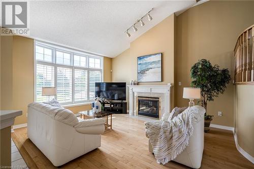 2278 Turnberry Road Unit# 13, Burlington, ON - Indoor Photo Showing Living Room With Fireplace