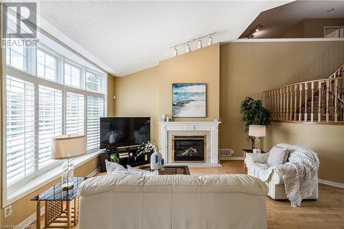 2278 Turnberry Road Unit# 13, Burlington, ON - Indoor Photo Showing Living Room With Fireplace