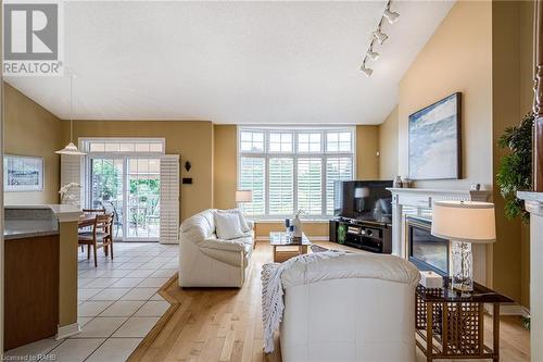 2278 Turnberry Road Unit# 13, Burlington, ON - Indoor Photo Showing Living Room With Fireplace