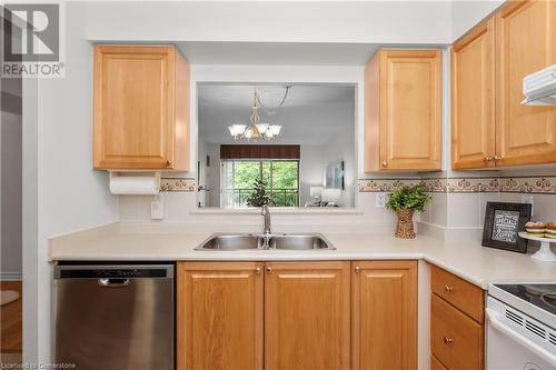 100 Burloak Drive Unit# 1214, Burlington, ON - Indoor Photo Showing Kitchen With Double Sink