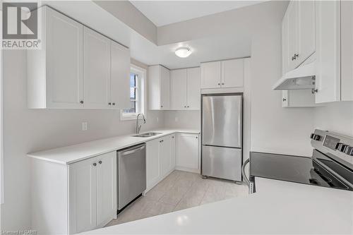 219 Dundas Street E Unit# 18, Waterdown, ON - Indoor Photo Showing Kitchen With Stainless Steel Kitchen With Double Sink