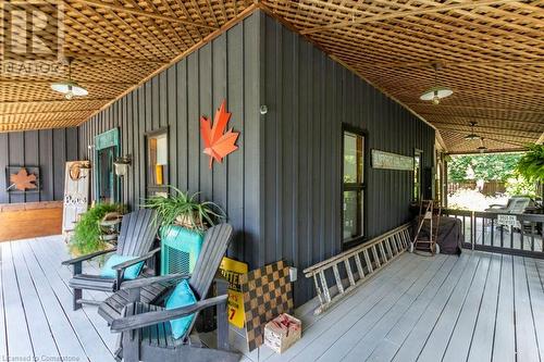 Wide wrap-around porch on 3 sides of the house - 627 Bayshore Boulevard, Burlington, ON - Outdoor With Deck Patio Veranda With Exterior