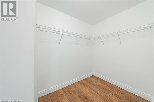 Primary Bedroom W/I Closet - 399 Elizabeth Street Unit# 608, Burlington, ON - Indoor With Storage