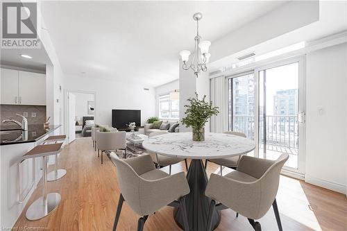 Dining [Virtually Staged] - 399 Elizabeth Street Unit# 608, Burlington, ON - Indoor Photo Showing Dining Room