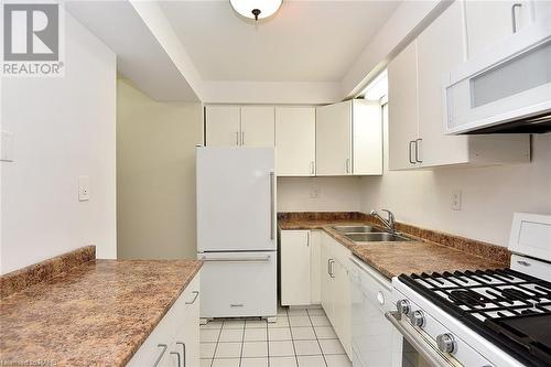 15 Derby Street Unit# 39, Hamilton, ON - Indoor Photo Showing Kitchen With Double Sink