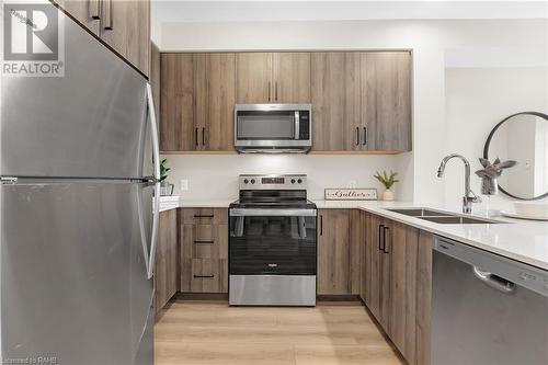 120 Spring Valley Crescent Unit# 410, Hamilton, ON - Indoor Photo Showing Kitchen With Stainless Steel Kitchen With Double Sink With Upgraded Kitchen