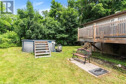 Oversized Deck Overlooks the Pool. - 47 Simson Avenue, Simcoe, ON - Outdoor With Above Ground Pool With Deck Patio Veranda