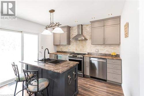 Kitchen with Walk Out to Oversized Deck. - 47 Simson Avenue, Simcoe, ON - Indoor Photo Showing Kitchen With Stainless Steel Kitchen With Double Sink With Upgraded Kitchen