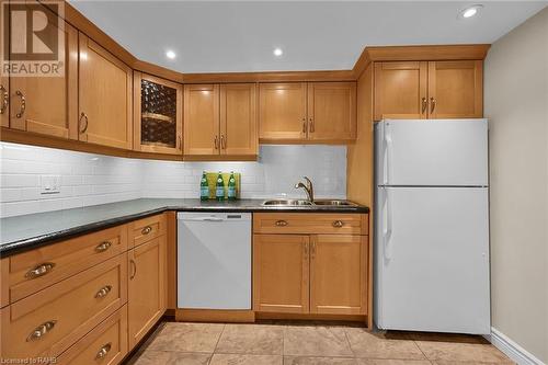 150 Wilson Street W Unit# 112, Ancaster, ON - Indoor Photo Showing Kitchen With Double Sink