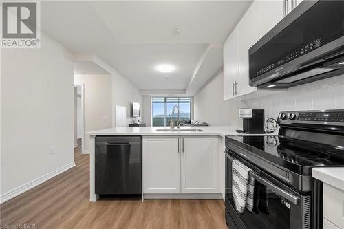 2750 King Street E Unit# 215, Hamilton, ON - Indoor Photo Showing Kitchen With Double Sink