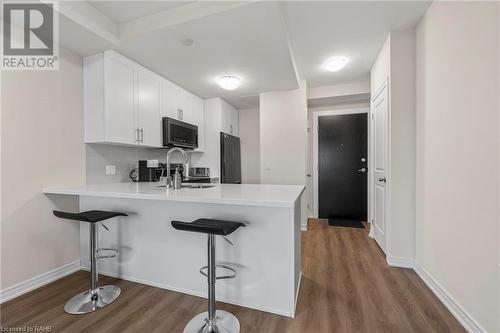 2750 King Street E Unit# 215, Hamilton, ON - Indoor Photo Showing Kitchen With Upgraded Kitchen