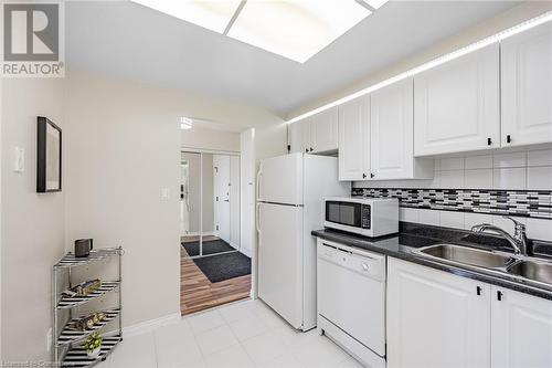 Room in Kitchen for a breakfast table and chairs - 135 Hillcrest Avenue Unit# 1014, Mississauga, ON - Indoor Photo Showing Kitchen With Double Sink