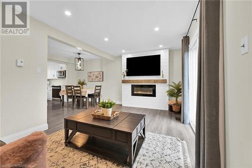 125 Livingston Avenue Unit# 16, Grimsby, ON - Indoor Photo Showing Living Room With Fireplace