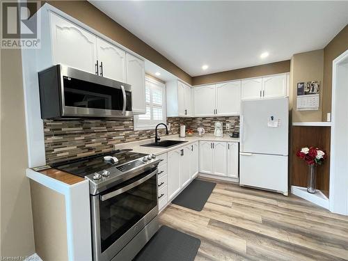 Kitchen - view from eat in area - 407 Melanie Crescent, Ancaster, ON - Indoor Photo Showing Kitchen