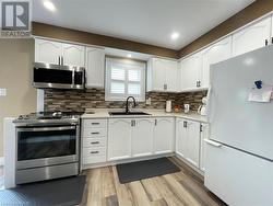 Kitchen - view from entry hall - 