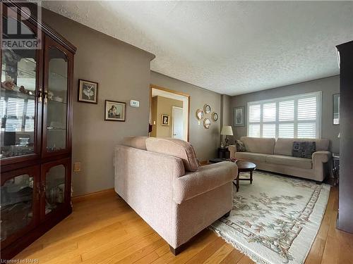 Main living room - looking at front window and entry hall - 407 Melanie Crescent, Ancaster, ON - Indoor Photo Showing Living Room