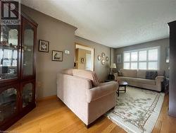 Main living room - looking at front window and entry hall - 