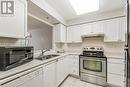 100 Burloak Drive Unit# 2405, Burlington, ON  - Indoor Photo Showing Kitchen With Double Sink 