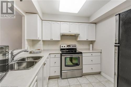 100 Burloak Drive Unit# 2405, Burlington, ON - Indoor Photo Showing Kitchen With Double Sink