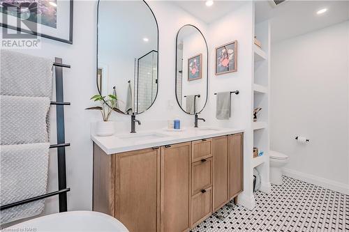 Toasty toes on your heated floor - 41 East 32Nd Street, Hamilton, ON - Indoor Photo Showing Bathroom