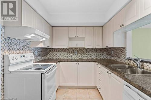 216 Plains Road W Unit# D307, Burlington, ON - Indoor Photo Showing Kitchen With Double Sink